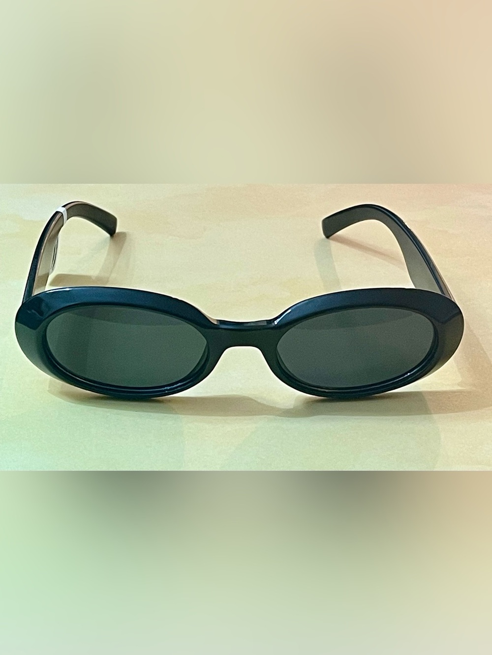 Free People Glossy Black Slim Oval Retro Boho Sunglasses with gold accents - Picture 13 of 15